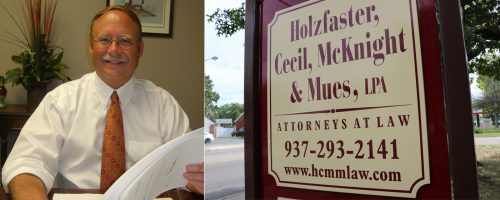 Holzfaster, Cecil, McKnight & Mues, LPA Dayton law firm sign with Robert L Mues, Esq.